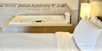 King Bed and Jetted Hot Tub at Holiday Inn College Station - Aggieland, College Station, Texas