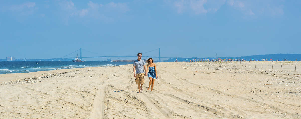 Couple Walking in the Sand on a Scenic Area of the New Jersey Shore
