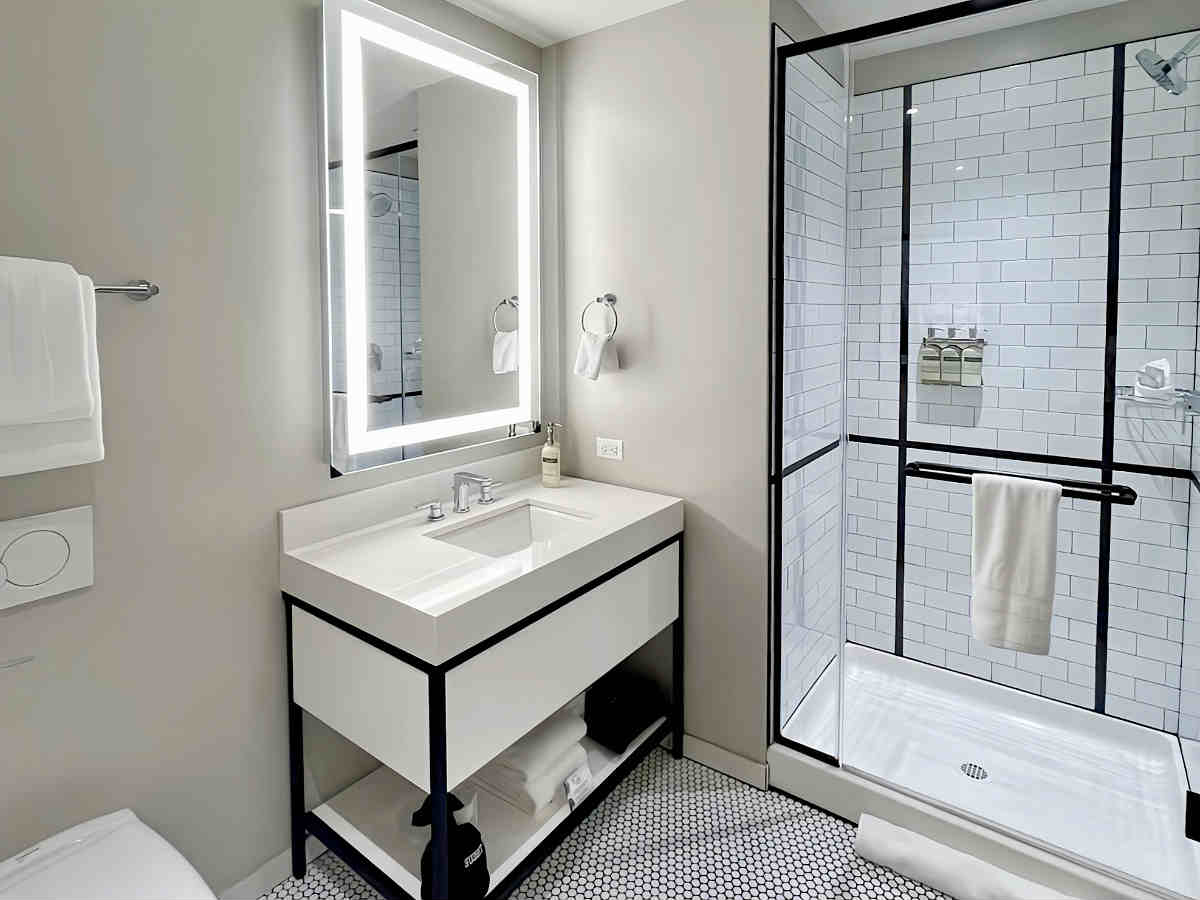 Walk-In Shower in the Bathroom of a Suite at the Arlo Chicago Hotel.