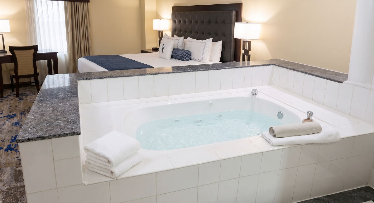 Beautiful Whirlpool Tub and King Bed in a Suite at the Atheneum Hotel, Detroit, Michigan