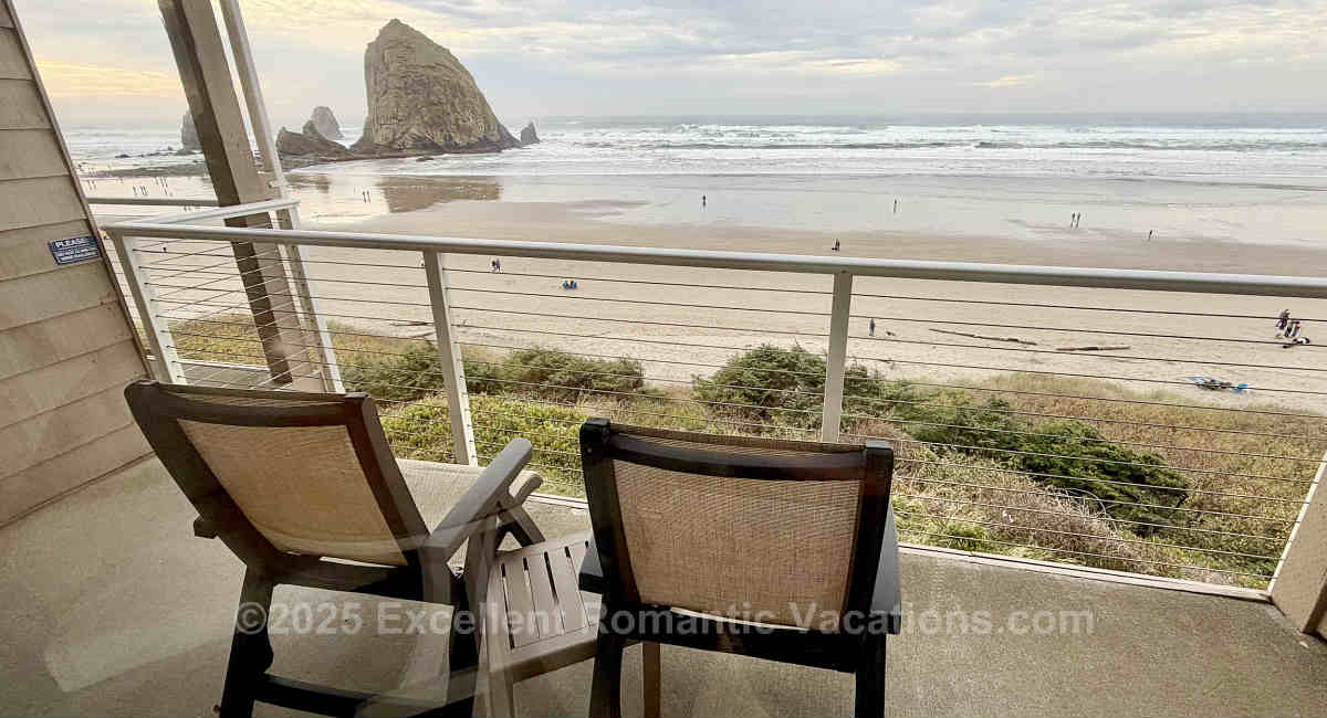 View of Haystack Rock and the Pacific Ocean from the Balcony of an Oceanfront King Jetted Tub Suite at the Hallmark Resort & Spa on the Oregon Coast in Cannon Beach, OR.