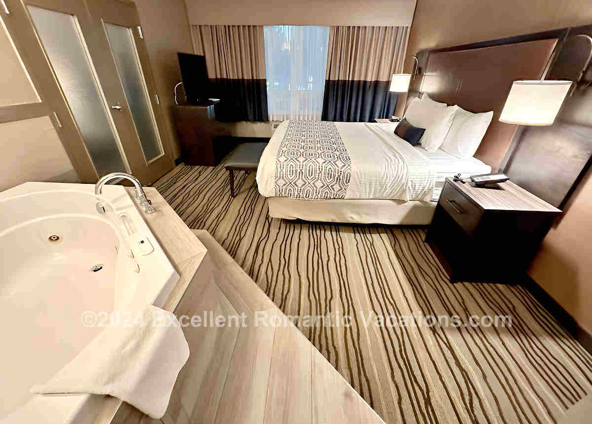 Luxury Best Western Plus Calgary Center Suite with a King Bed and a 2-Person Whirlpool Tub