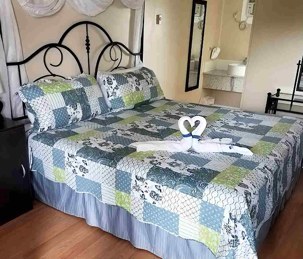 King Bed in a Bedroom at the Blue Moon Motel, Niagara Falls ON