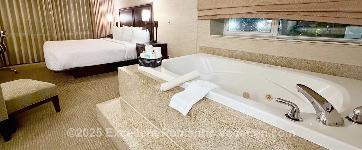 King Bed and 2-Person Jetted Tub in a Suite at the Best Western Eastgate Hotel in Bellevue, WA.