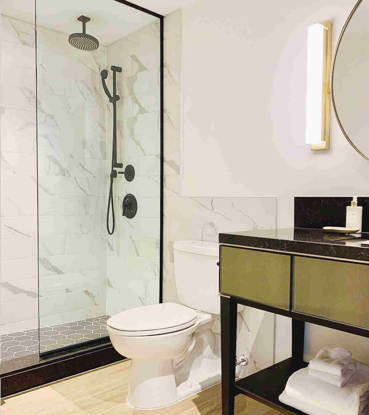 Beautiful Walk-in Rain Shower in a King Room at the C. Baldwin Hotel by Hilton in Houston, TX.