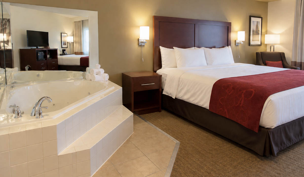 King Bed & Private In-Room Whirlpool Tub at Comfort Suites Atlantic City North, NJ.