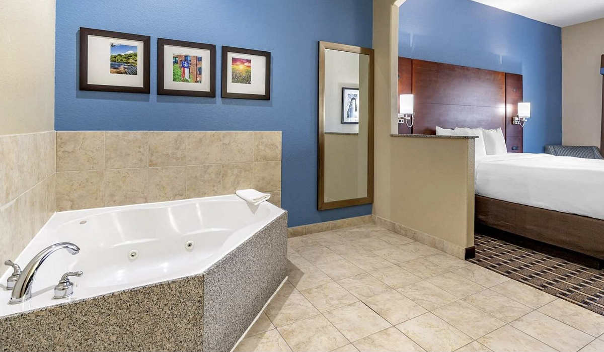 2-Person In-Room Hot Tub and King Bed in a Suite at Comfort Suites Hotel in Georgetown, Texas