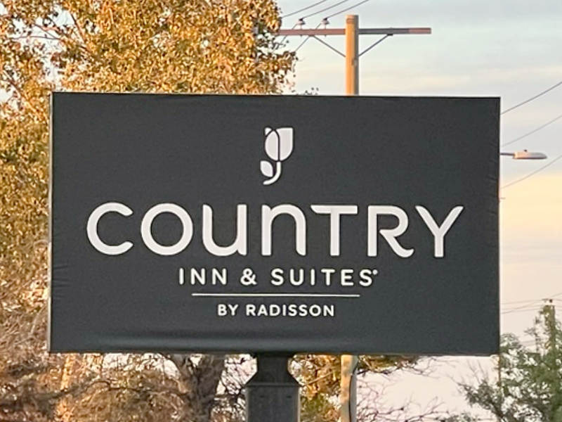 Sign In Front of Country Inn & Suites Hotel