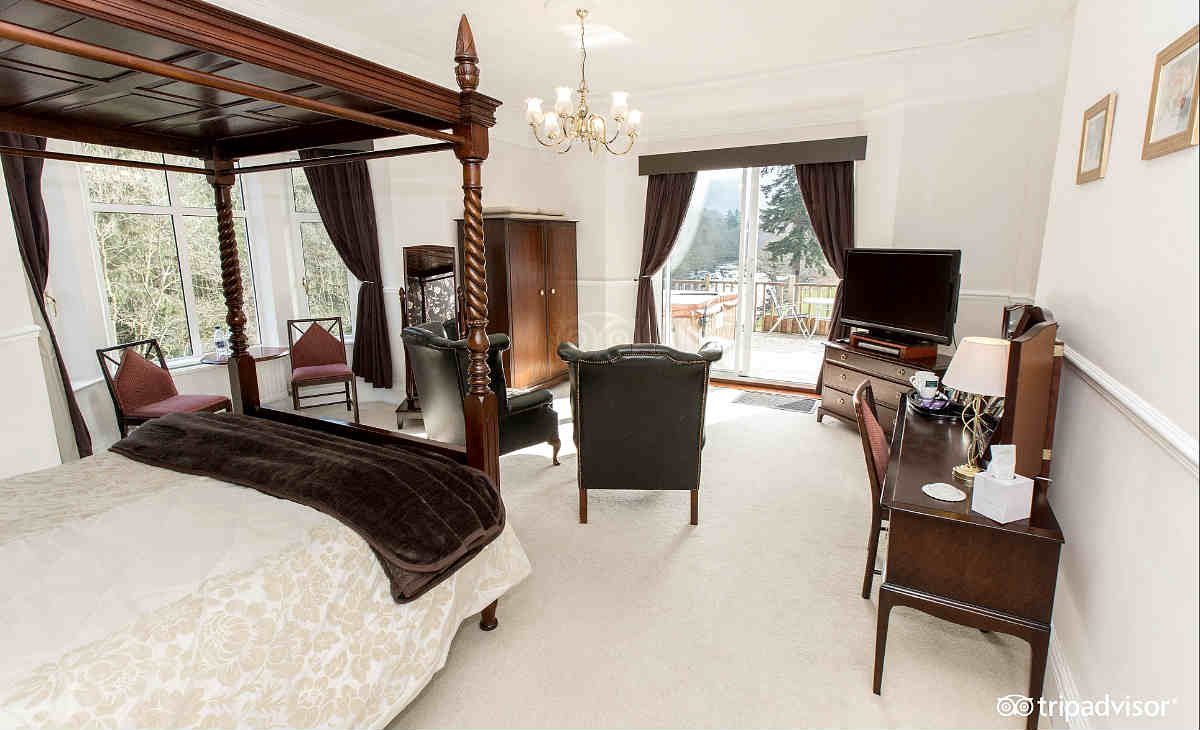 Romantic Four-Poster Bed Room at the Craig-y-Dderwen Hotel in North Wales