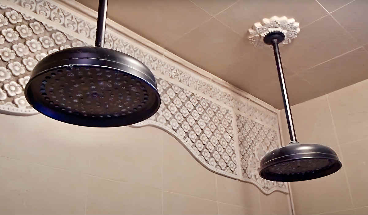 Photo of a Shower with 2 Rain Shower Heads at the Pantai Inn in La Jolla, CA.