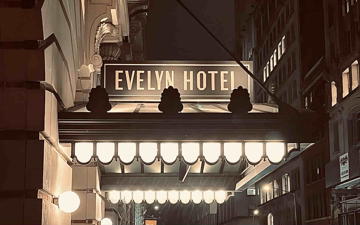 Sign at Night Above the Evelyn Hotel in NYC.