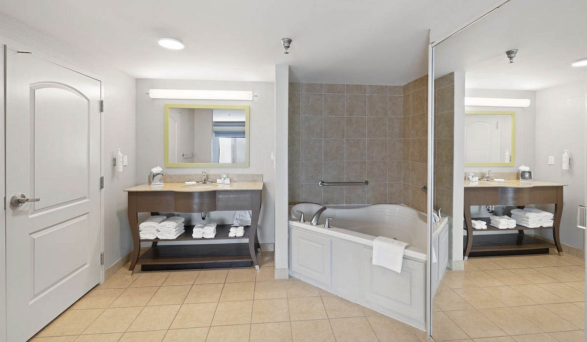 Master Bath with a Whirlpool Tub at the Hampton Inn & Suites Madera CA