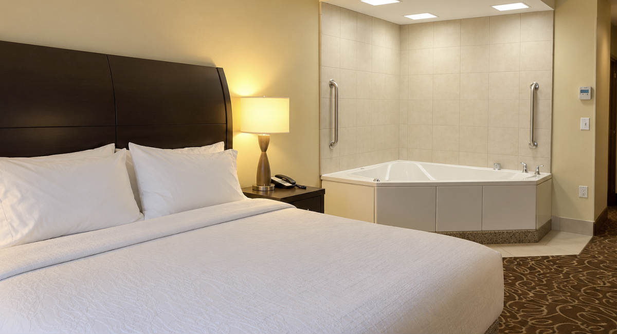 King Bed and In-Room Whirlpool Tub at the Hilton Garden Inn Salt Lake City / Sandy, Utah