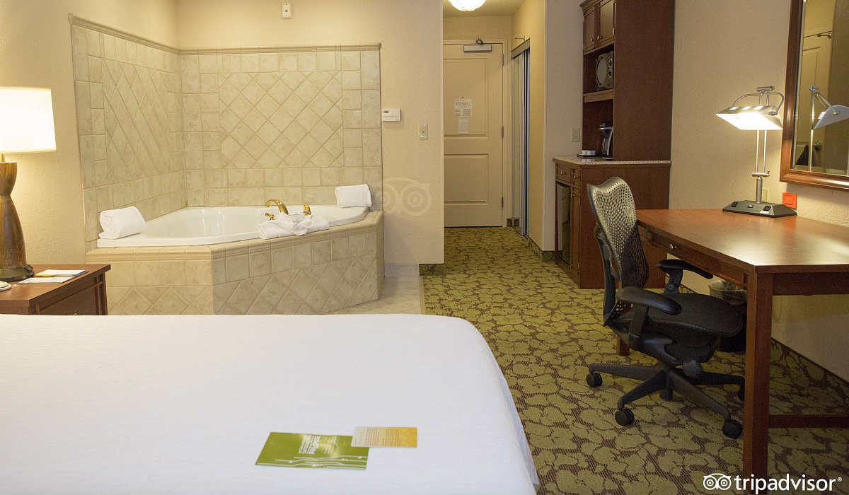 King Room with a Corner Whirlpool Tub at the Hilton Garden Inn