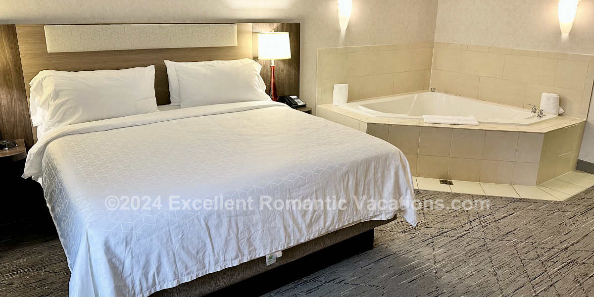 King Bed with Jetted Tub at the Holiday Inn Express & Suites in Alexandria, VA