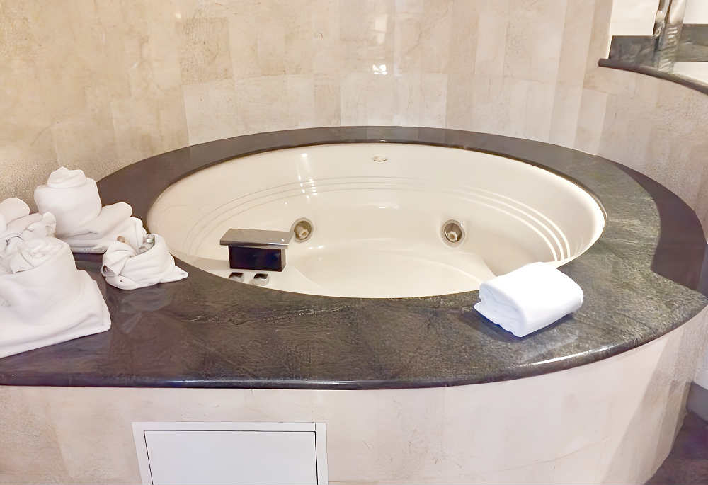 A Private In-Room Jetted Spa Tub Big Enough for 2 People in a Suite at the Hollywood Hotel.