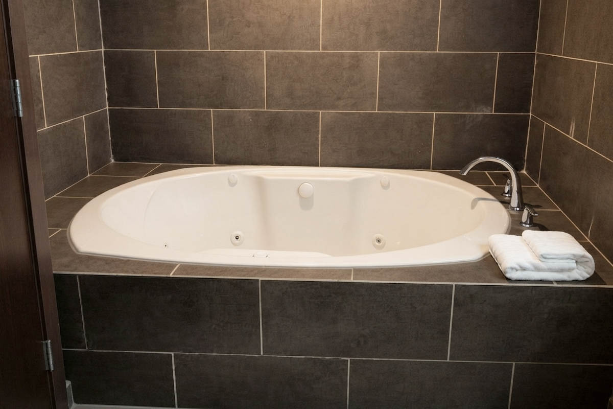 Comfortable jetted tub suite at Comfort Suites Denver International Airport