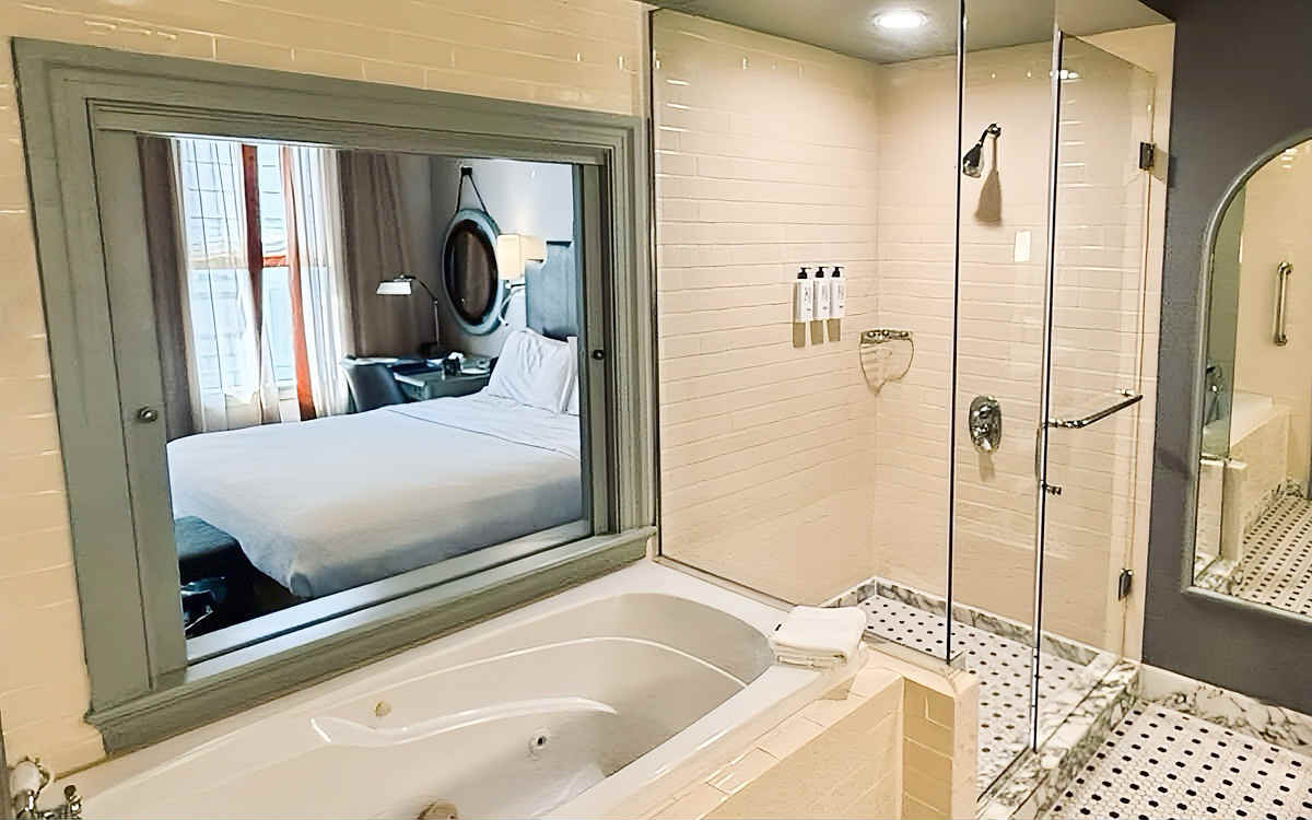 Jetted Tub and Spacious Walk-In Shower in a Suite at Hotel ICON, Houston TX.