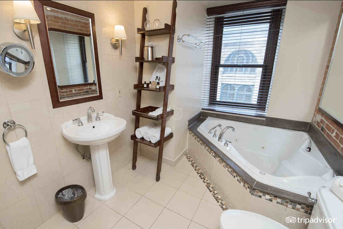 Bathroom with a Jetted Tub for 2 Persons in a Petit Suite at the Hotel Nelligan in Montreal, QC