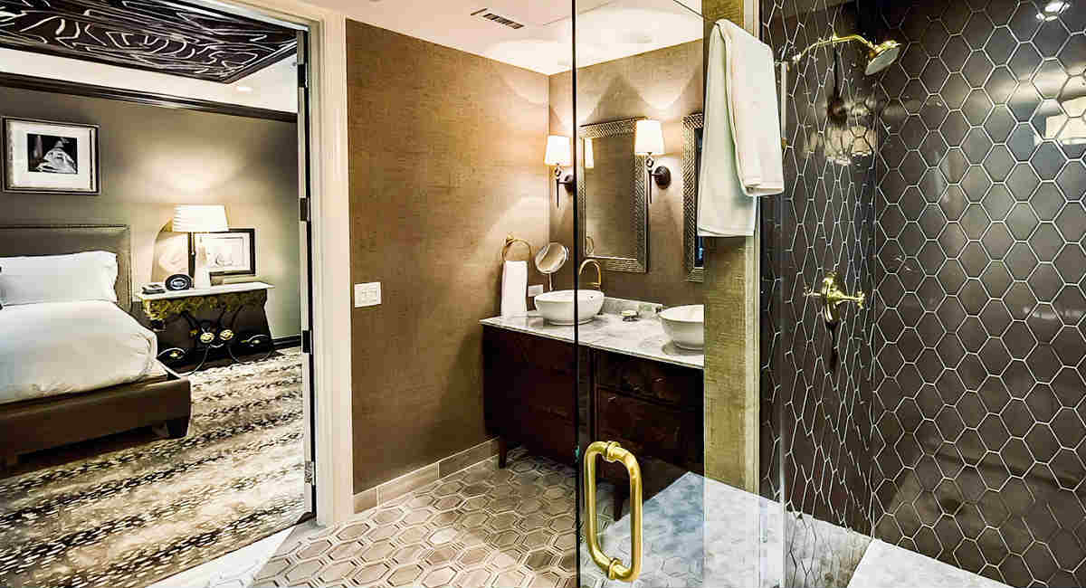 Suite with a King Bed and Spa-Style Bathroom with Walk-In Shower at Hotel ZaZa in Houston, TX