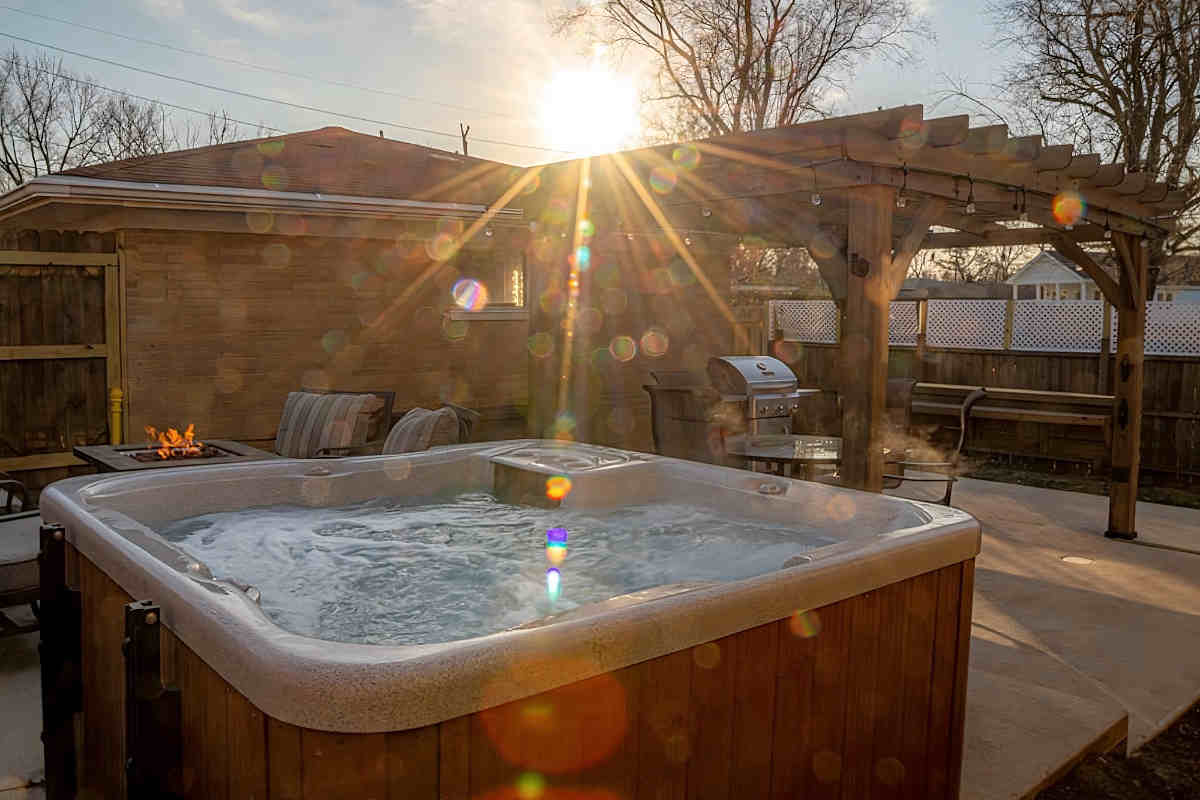 Private Deck and Hot Tub at Sunset, Romantic Vacation Rental in Gary, Indiana.