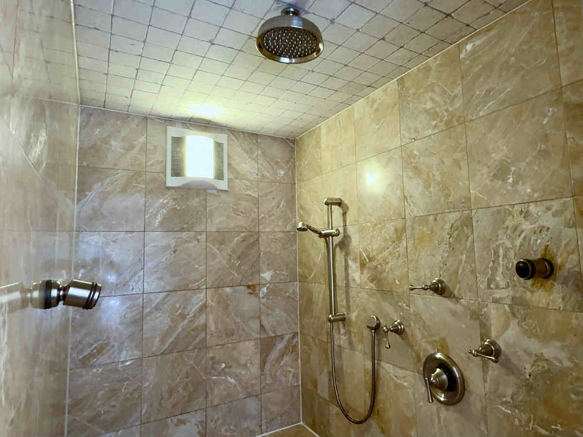 Walk-In Shower with Body Jets in an Executive Guestroom at New York City's Kimberly Hotel.