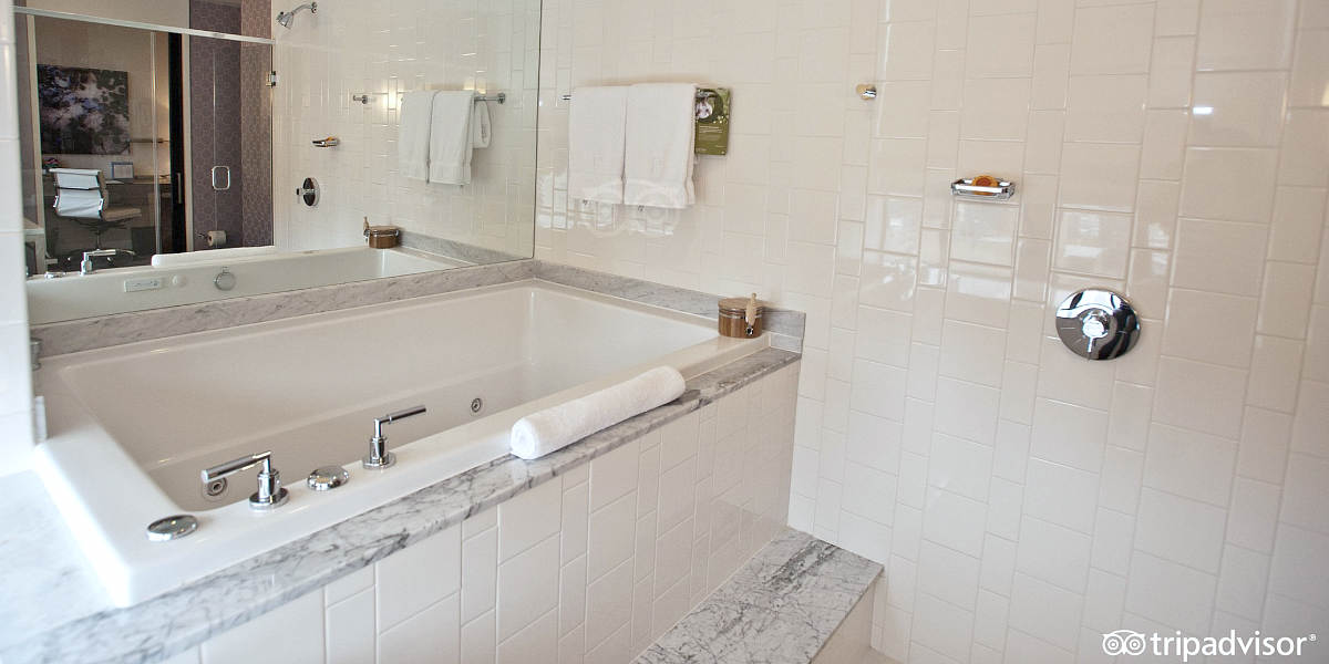 Oversized Jetted Spa Tub in the Master Bath of a Suite at the Kimpton Hotel Palomar in Downtown Philadelphia, PA.