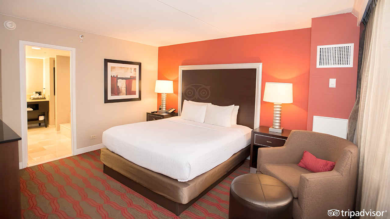 King Bed in a Suite at the La Guardia Plaza Hotel in Queens, NY