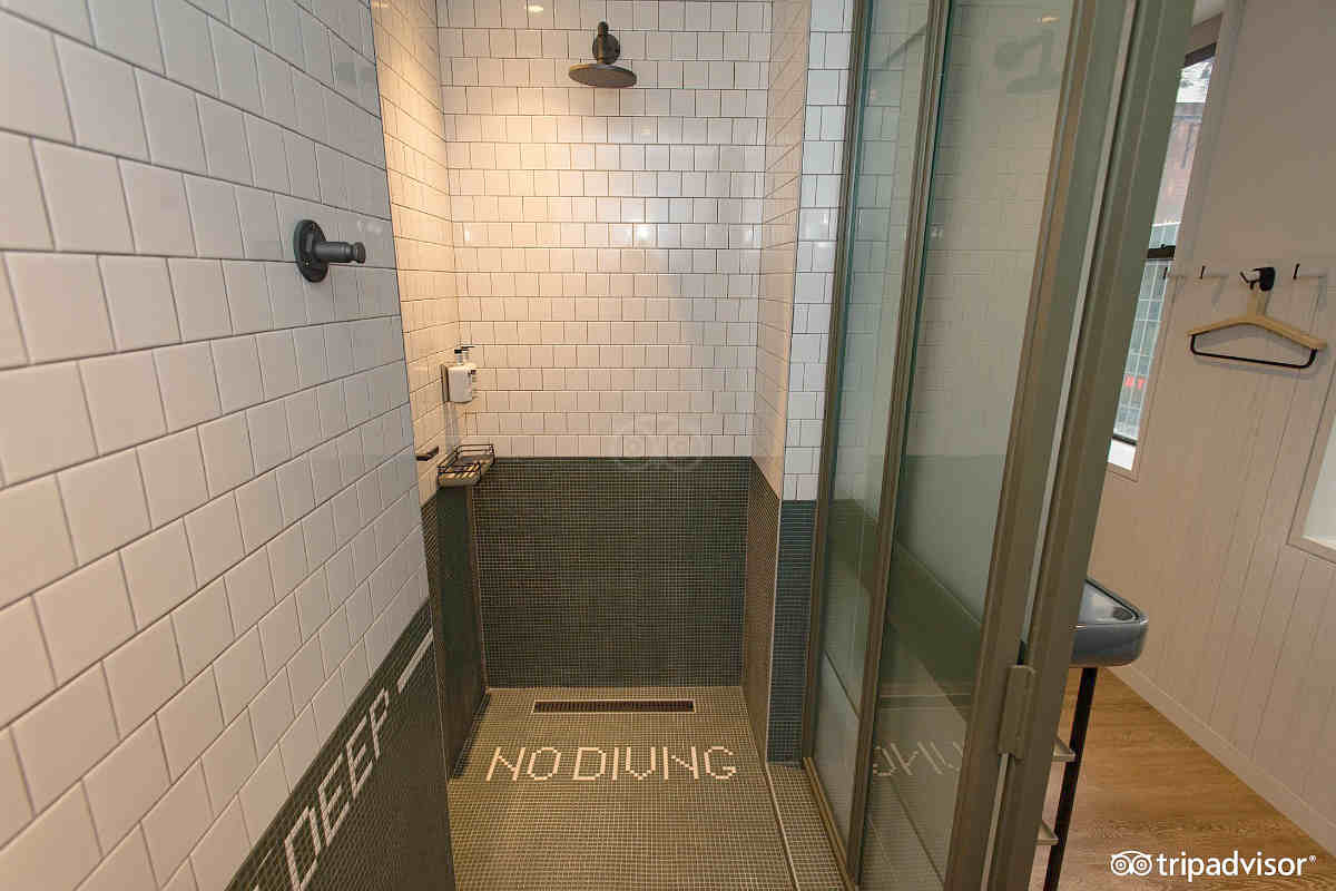 Spacious Walk-In Rain Shower in a Suite at the Moxy NY Times Square Hotel.