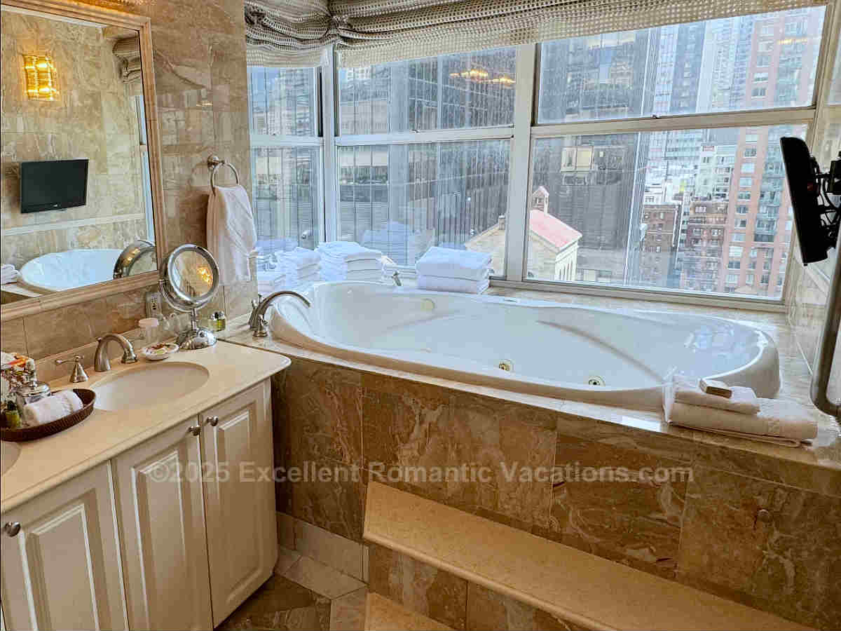 Marble Bathroom with a JACUZZI® Tub in an Executive Guestroom at the Kimberly Hotel in NYC.