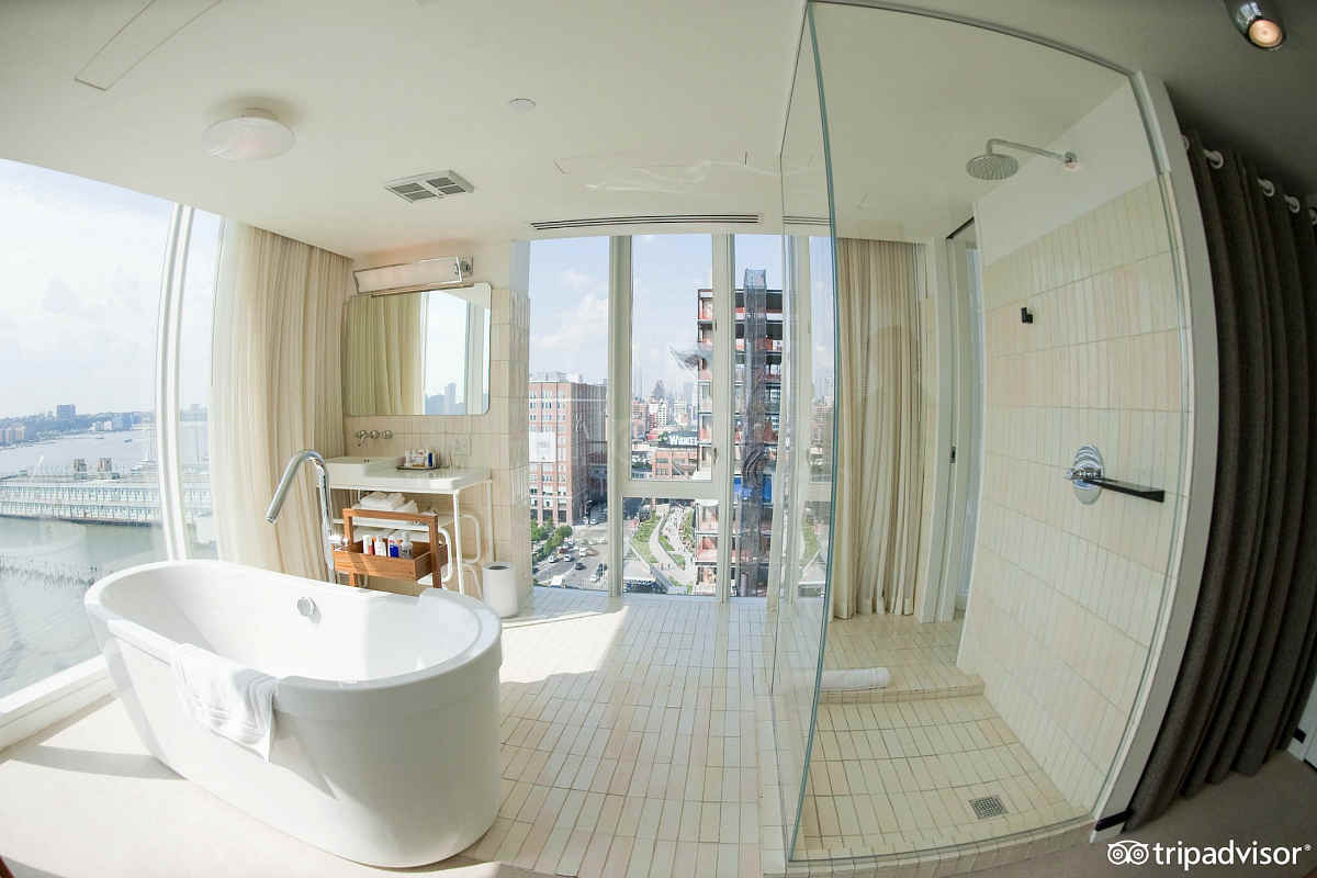 Panoramic NYC Views from the Hudson Jr Suite with Walk-In Rain Shower and Deep Soaking Tub at the Standard Highline Hotel.