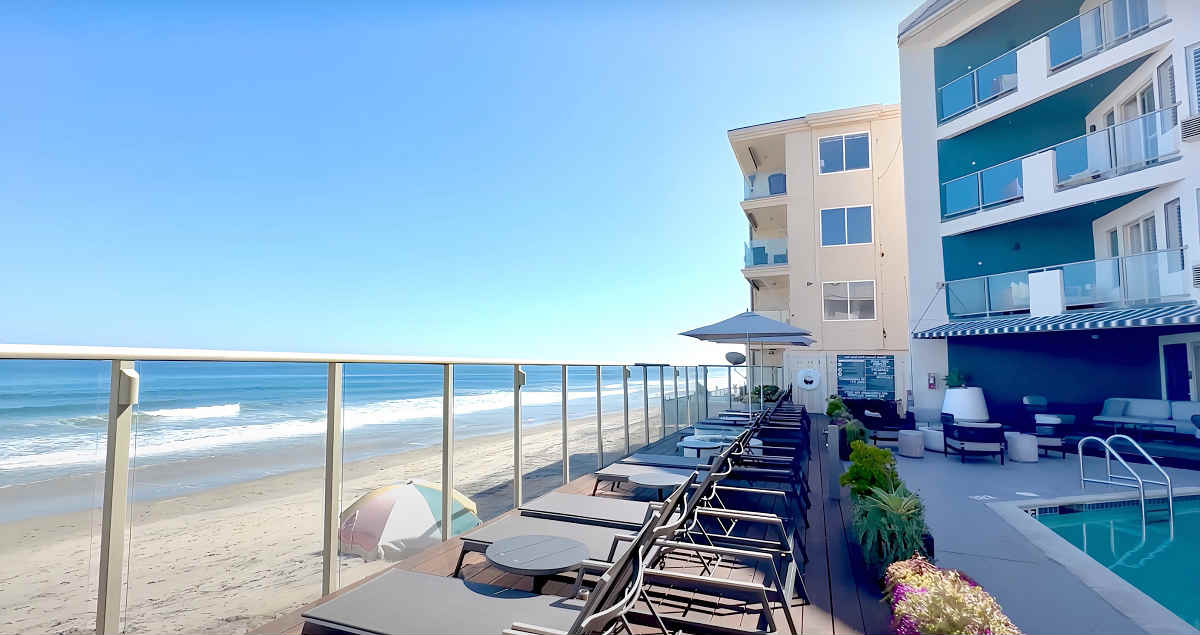 Photo of Oceanfront Pool and Recliners at Beach Terrace Inn, Carlsbad, CA