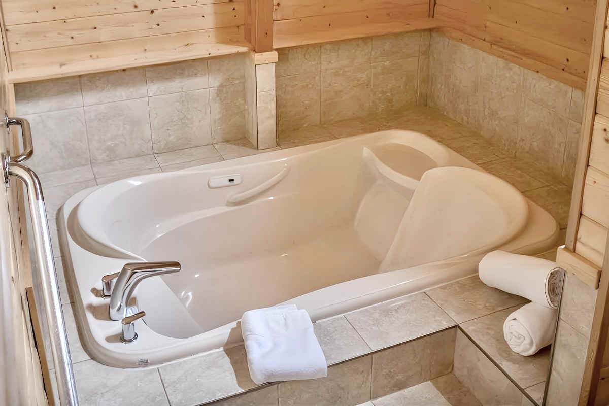 2-Person JACUZZI® Tub Inside a Romantic Cabin at Oyster Bay Resorts on Northern Vancouver Island, BC.