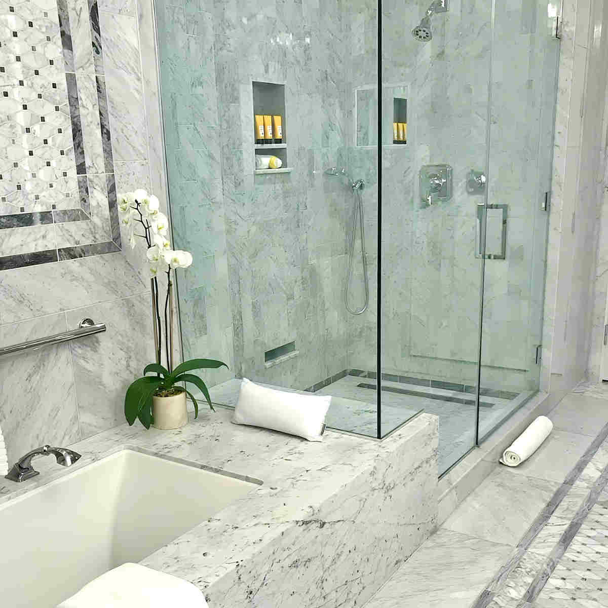 Luxurious Spa-Style Bathroom with Deep Soaker Tub and Walk-In Shower at the Post Oak Hotel at Uptown Houston, TX