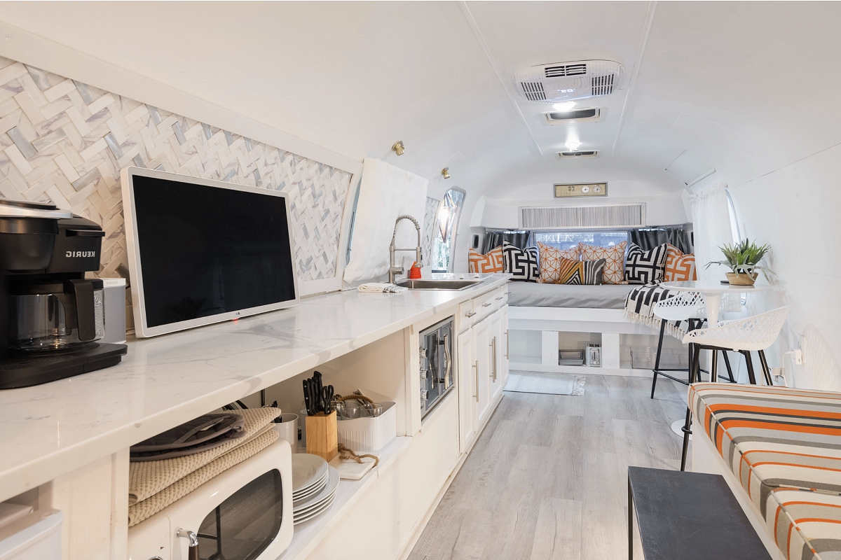 Full Kitchen Inside an Airstream Trailer as Part of the Easy Tiger Romantic Vacation Rental in the Blue Ridge Mountains, Georgia. 