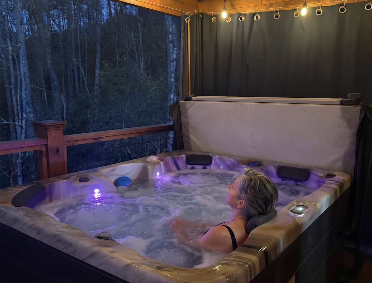 Evening in a Private Outdoor Hot Tub at Meraki Escape, North Carolina.