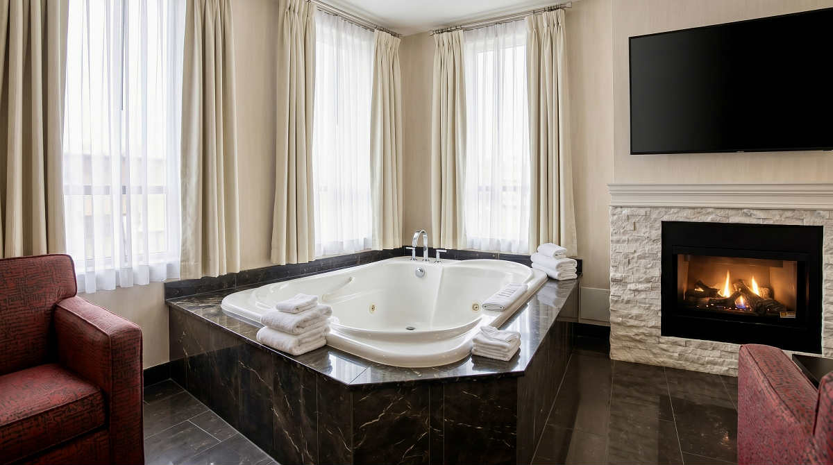 Whirlpool Tub and Fireplace Inside a Suite at C Hotel by Carmen's, Hamilton ON