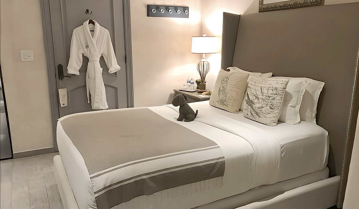 Queen Bed & Robes in a Romantic Suite at the Olive Boutique Hotel in San Juan, Puerto Rico