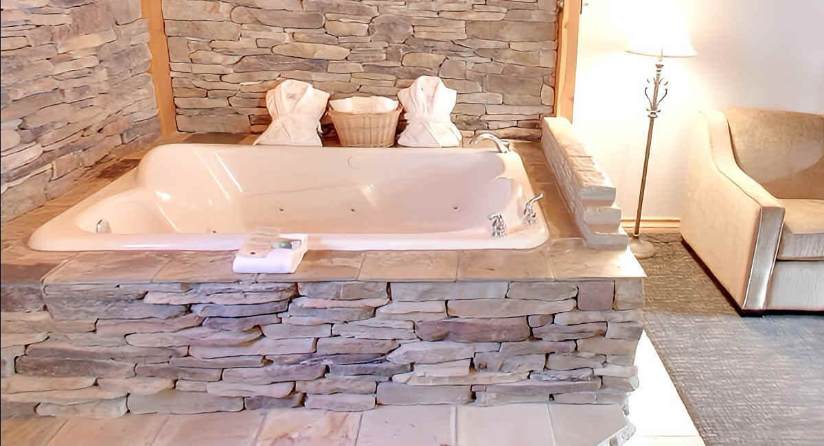 Spacious Jetted Tub for 2 Persons in a Loft at Rundlestone Lodge in Banff, Alberta