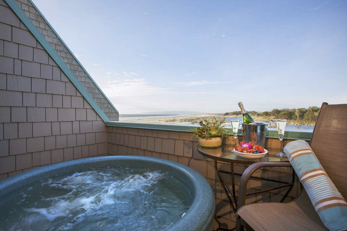 Hot Tub Big Enough for 2 People on the Private Patio of a Honeymoon Suite at SeaVenture Beach Hotel in Pismo Beach, California.
