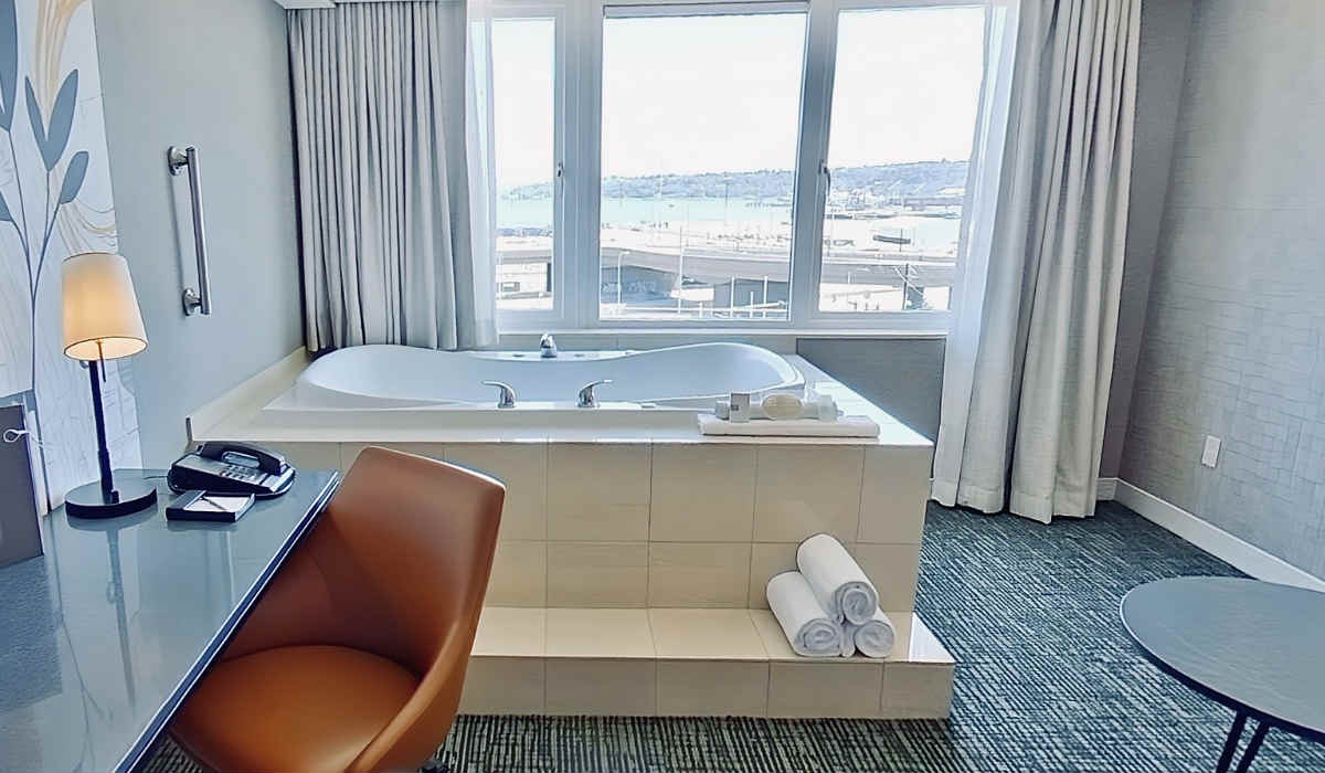 JACUZZI® Tub Suite with Ocean View at Silver Cloud Seattle Stadium Hotel in Downtown Seattle, WA.