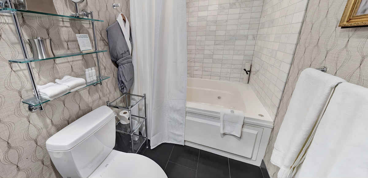 Master Bath with a Whirlpool Tub at the Allegro Royal Sonesta Hotel Chicago Loop