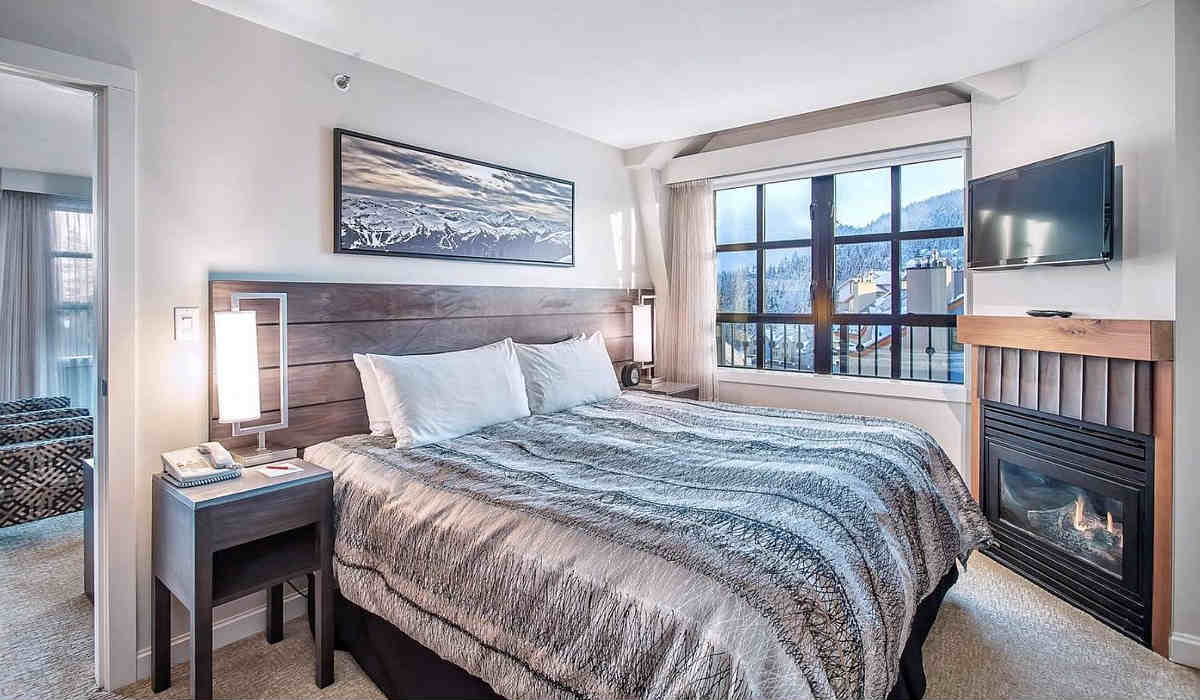 Romantic King Bed Honeymoon Suite with Fireplace and Mountain Views at the Sundial Hotel, Whistler, BC.