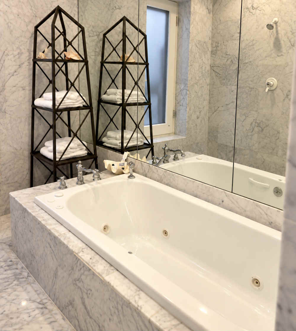 Marble Bathroom with a Jetted Spa Tub at Swann House B&B in Washington, DC.