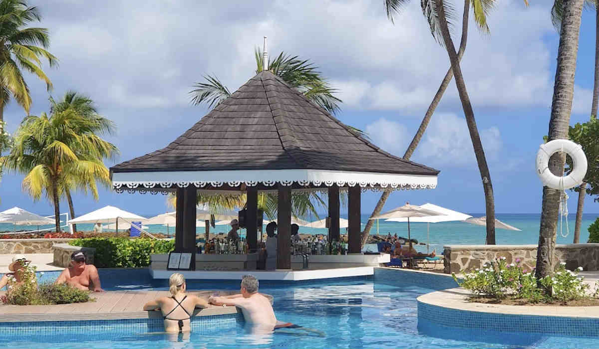 Couples at the Swim-Up Pool Bar at Stolentime Resort in St.Lucia