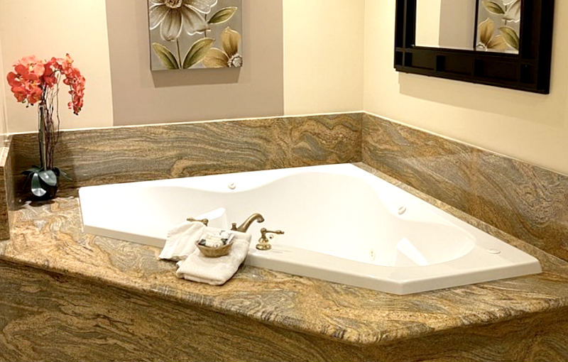 Inn at Churon Winery Room with a Whirlpool Tub in the Corner.