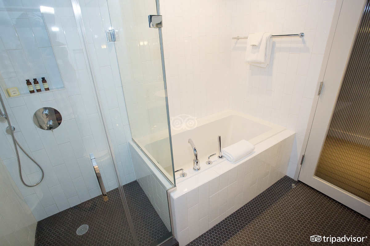 Spa-style Bathroom with a Deep Soaker Tub and Walk-In Shower for 2 at the Thompson Hotel, Chicago IL