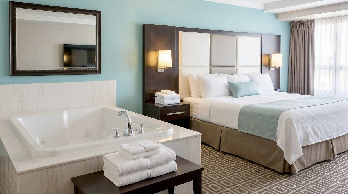 Affordable Suite with a King Bed and a JACUZZI® Tub at the Visitor's Inn, Hamilton, Ontario Affordable Suite with a King Bed and a JACUZZI® Tub at the Visitor's Inn, Hamilton, Ontario