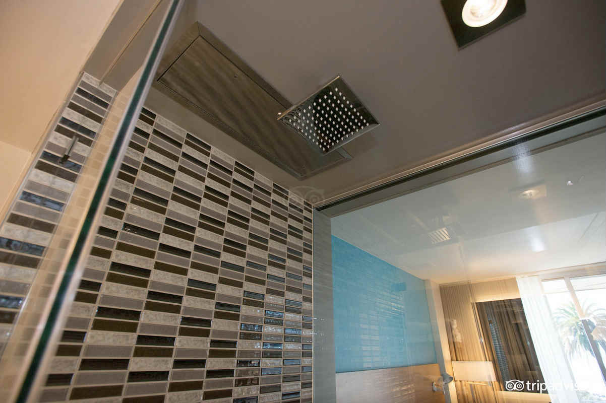 Walk-In Rain Shower in a Suite at the Shore Hotel in Santa Monica, CA.