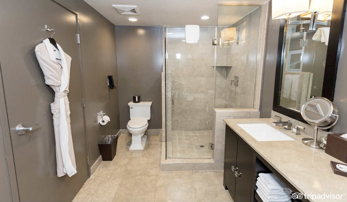 Spacious Glass Walk-In Shower With Robes at Luxe Sunset Boulevard Hotel in Los Angeles, CA